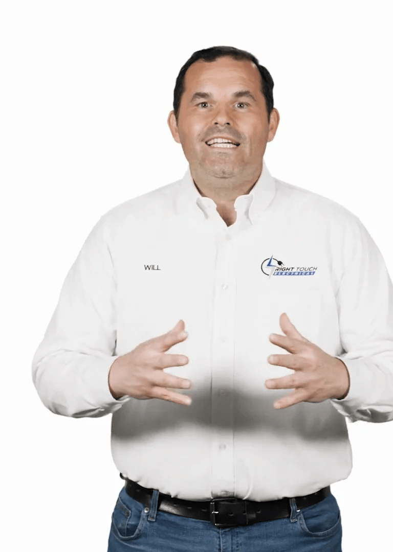 Will, master electrician at Right Touch Electrical, in a branded uniform